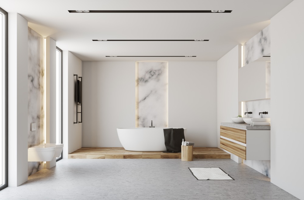 Modern bathroom with marble interior with bath tub